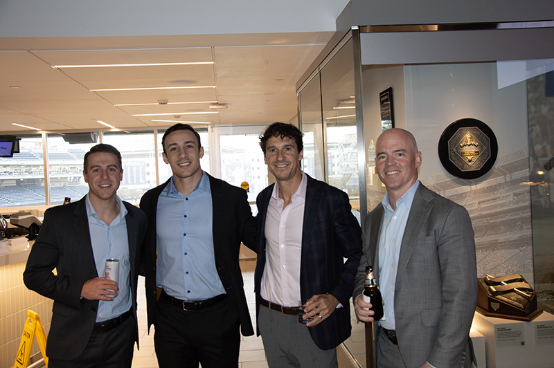 a group photo of young professionals smiling