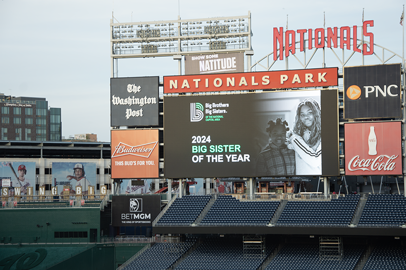 Nationals Park jumbo tron displaying an image of the 2024 Big Sister of the Year