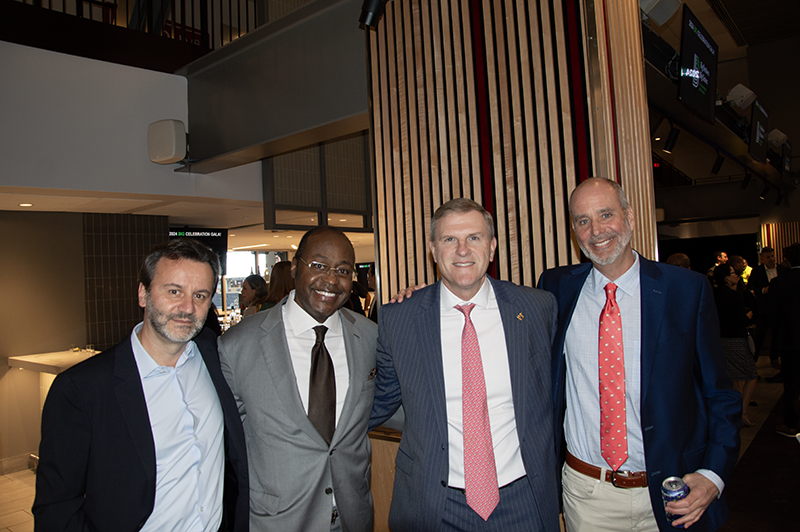 a group photo of young professionals smiling