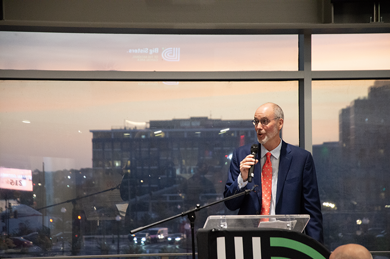 a male professional giving a speech