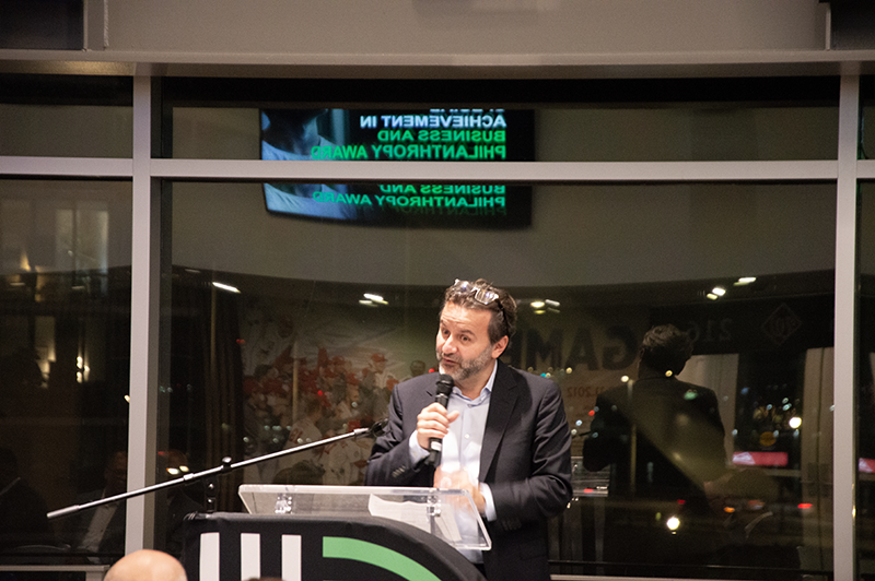 a male professional giving a speech