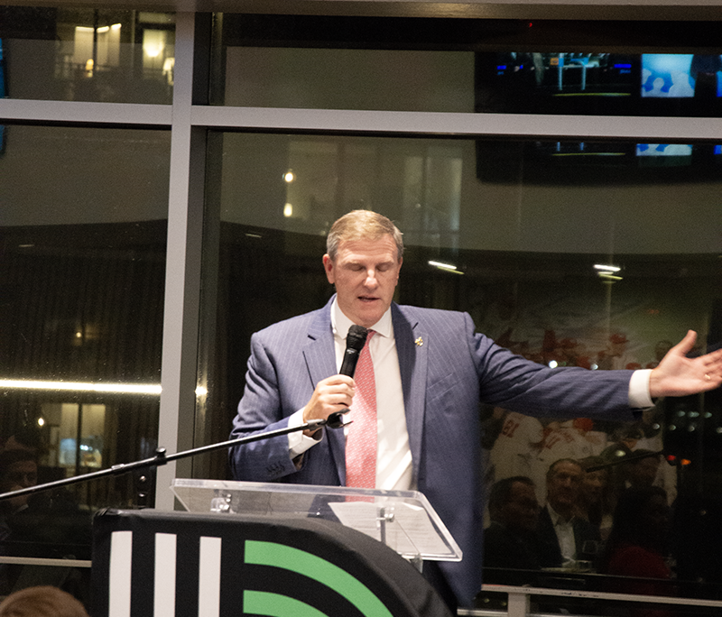 a male professional giving a speech
