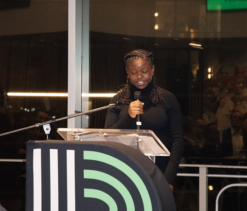 a young female teenager giving a speech