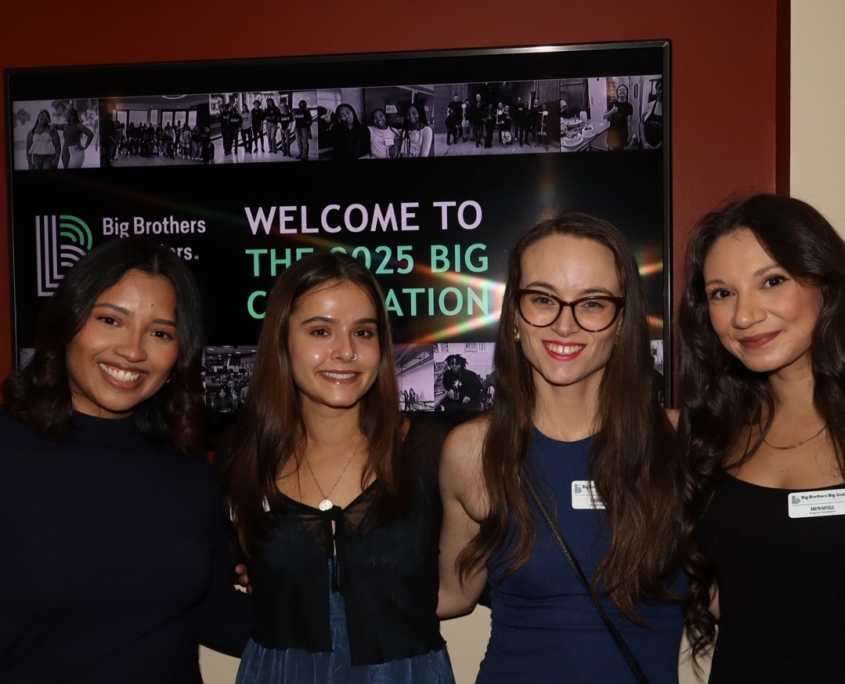 a group photo of people smiling