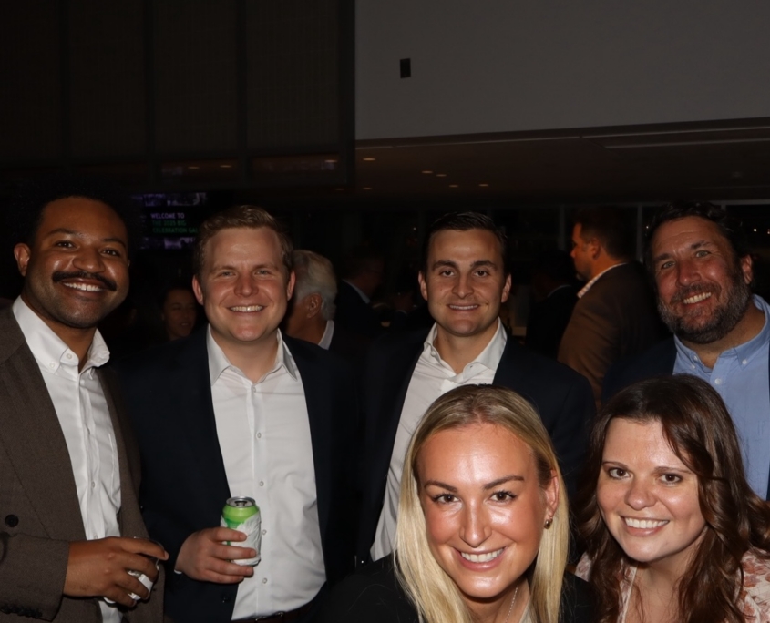 a group photo of people smiling