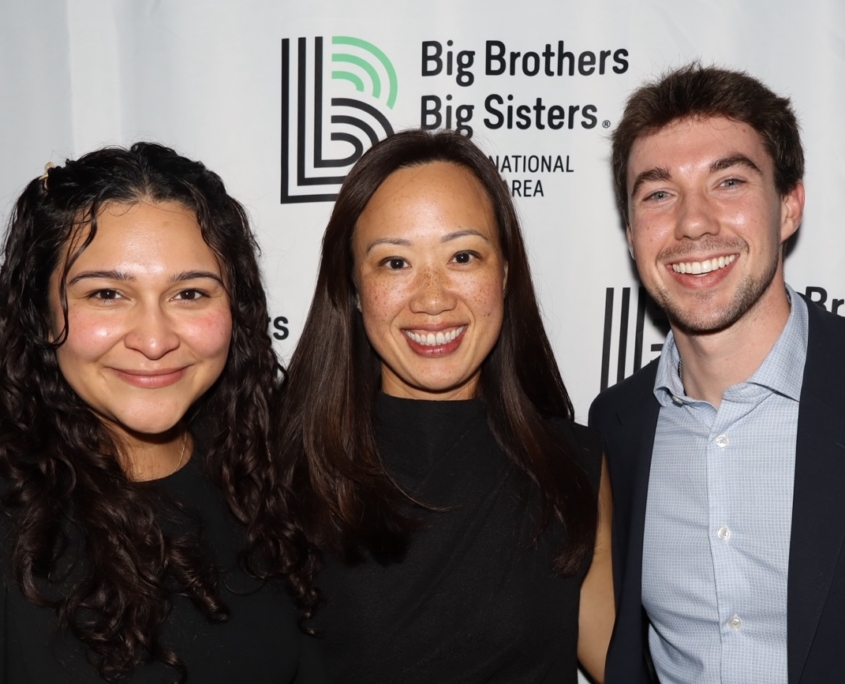 a group photo of people smiling