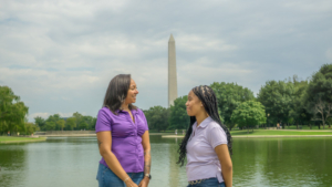 BSLS _26 shoot-01 a women and young girl smiling at each other in front of the lincoln memorial