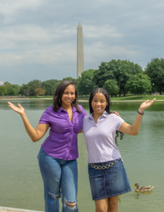 BSLS _26 shoot-03 a women and young girl posing for a photo in front of water